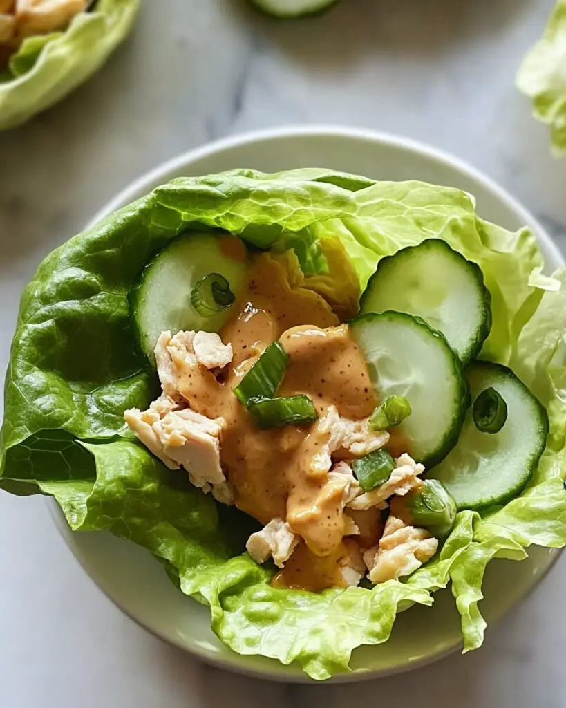 Crisp Chicken & Cucumber Lettuce Wraps Drizzled with Creamy Peanut Sauce