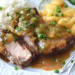Slow Cooked Peach Barbecue Smothered Pork Chops