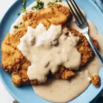 Satisfy Cravings with Chicken Fried Steak and Creamy Gravy 5 Chicken Fried Steak (Breaded Beef Cutlet with Gravy)