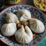 Delicious Nepali Yomari: Irresistible Stuffed Rice Dumplings 9 Nepali Yomari (Stuffed Rice Dumpling)