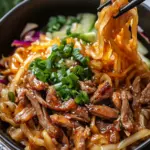 Potsticker Noodle Bowl with Pork & Cabbage Slaw – Easy & Delicious 6 Potsticker Noodle Bowl with Pork & Cabbage Slaw – Bold, Quick, and Better Than Takeout!